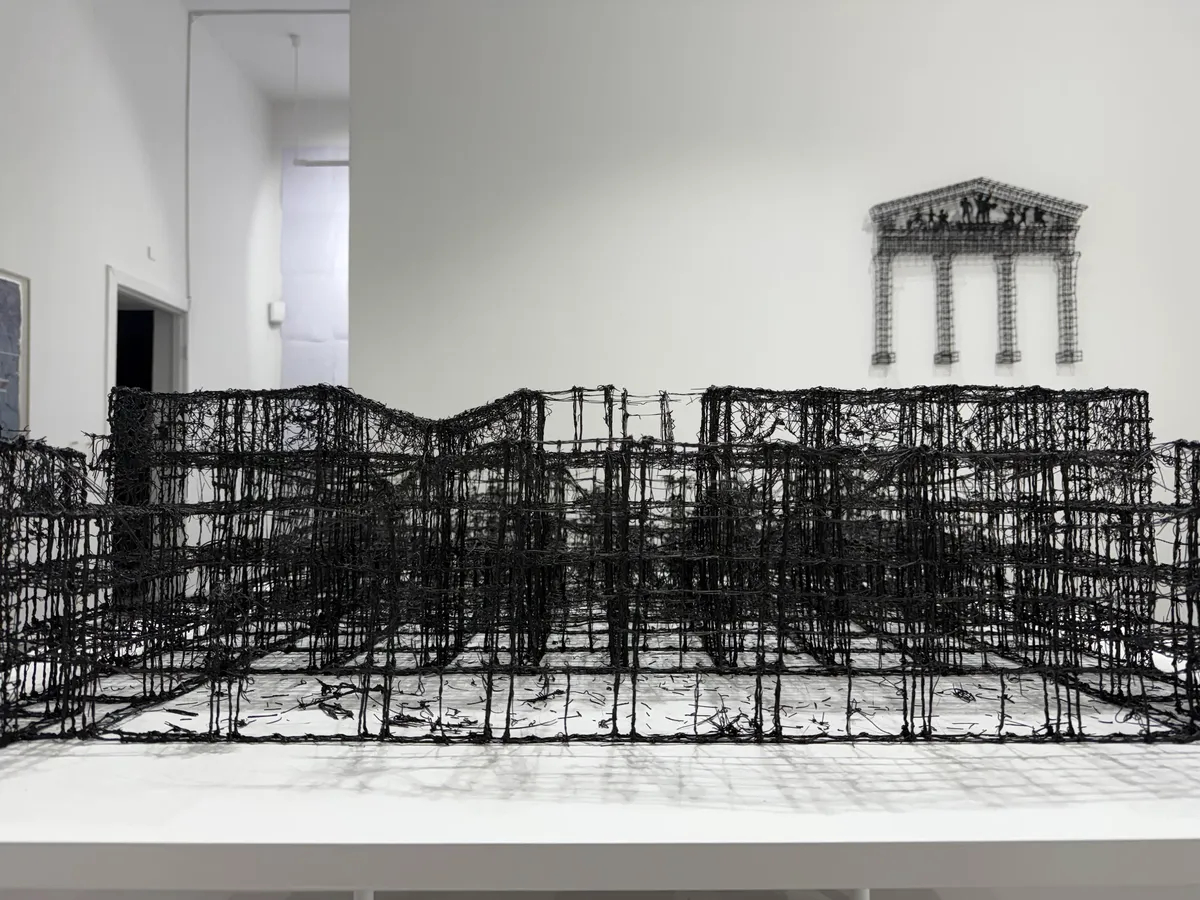 A 3D pen and graphite plastic model of the destroyed Mariupol Drama Theatre, part of Sergei Prokofiev’s work Hell, on display at Meduza’s No Exhibition in Berlin, May 2025. Photo: Tom Masters