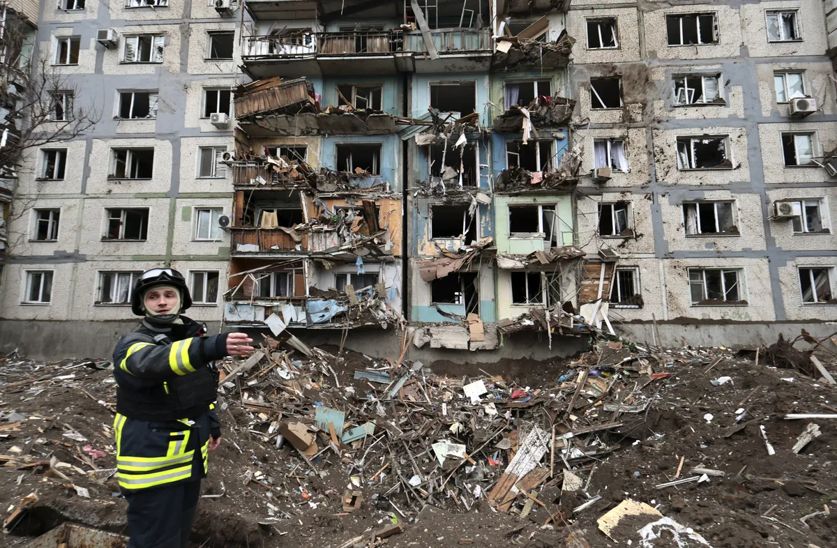 A Ukrainian rescue worker at the scene of a missile in Zaporizhzhia, Ukraine, 22 March 2024. Photo: EPA-EFE/KATERYNA KLOCHKO
