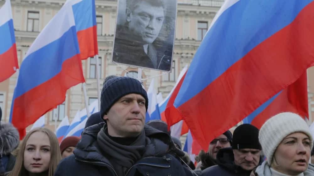 Alexey Navalny and his wife Yulia at a rally in memory of Boris Nemtsov in February 2018. Photo: EPA-EFE/MAXIM SHIPENKOV