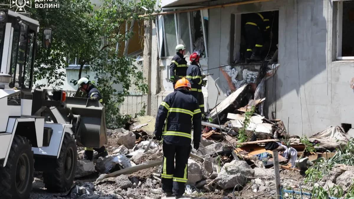 Rescue workers from Rivne region assisting with the emergency response after Russian drone strike. Photo: State Emergency Service of Ukraine.