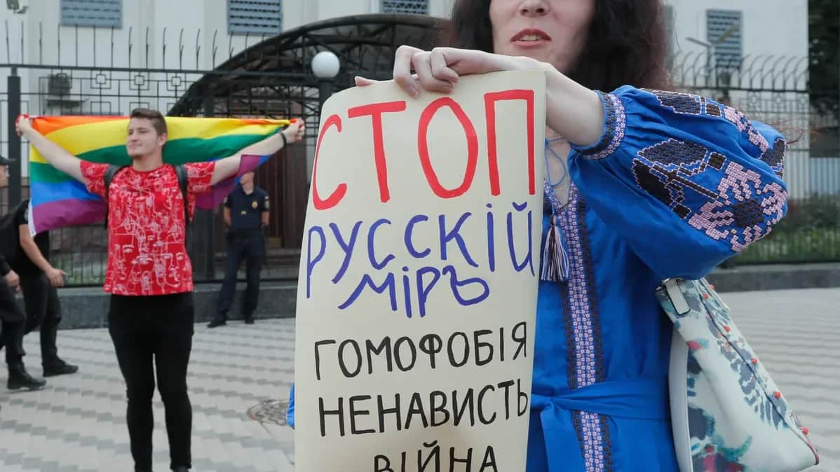 ‘STOP. Russian world. Homophobia. Hatred. War’. Photo: EPA-EFE/SERGEY DOLZHENKO
