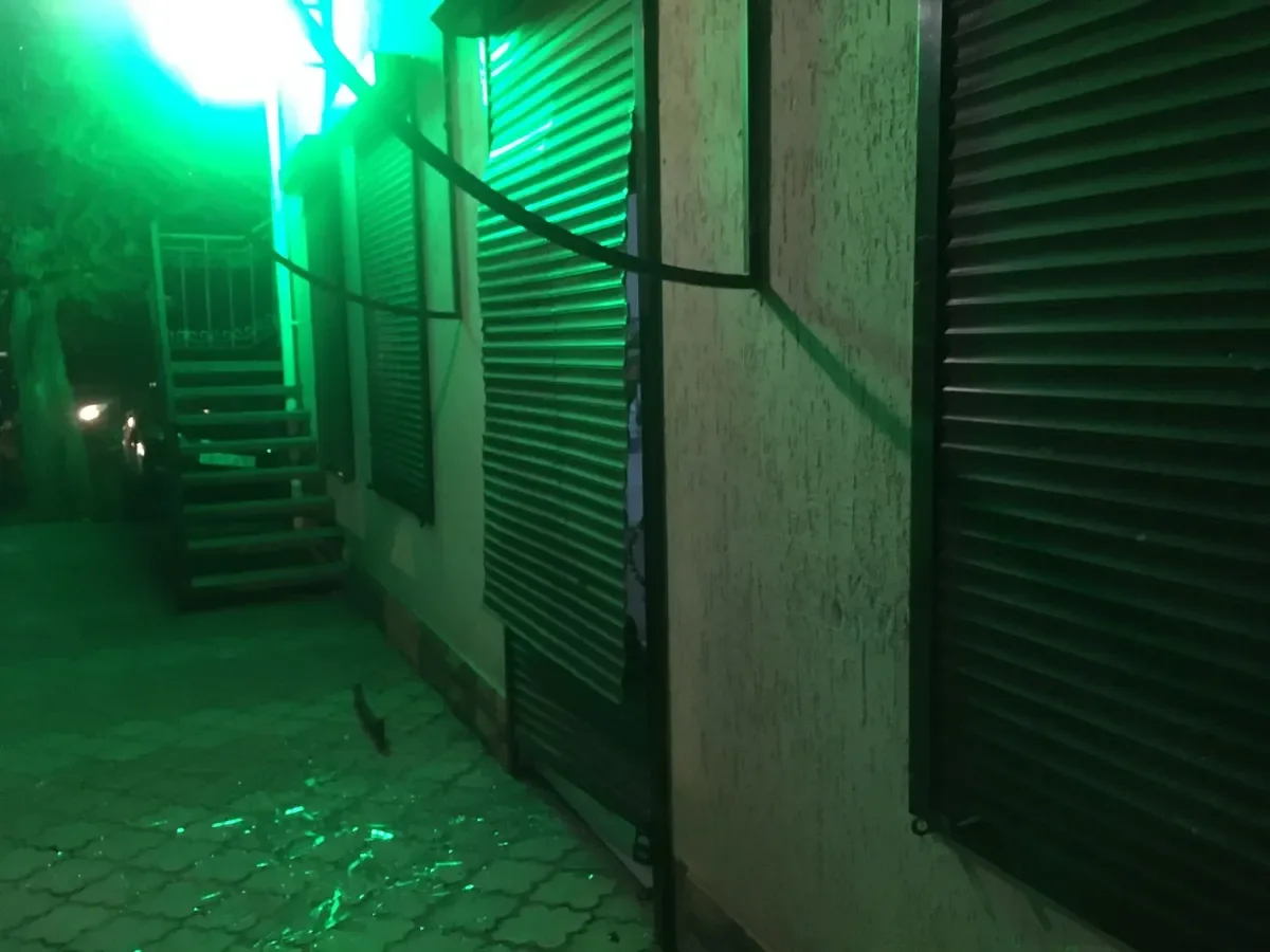 The roller blinds did not save a shop’s glass door from the shock wave. Photo by Sonia Mustaeva