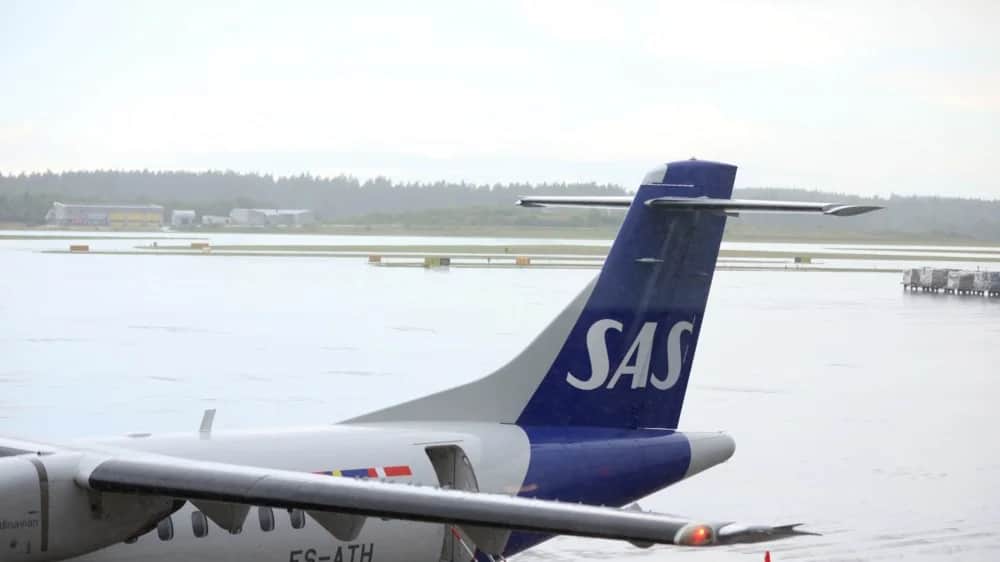 A Scandinavian Airlines plane on the tarmac at Stockholm Arlanda Airport in Maersta, Sweden, 4 July 2022. EPA-EFE/Ali Lorestani