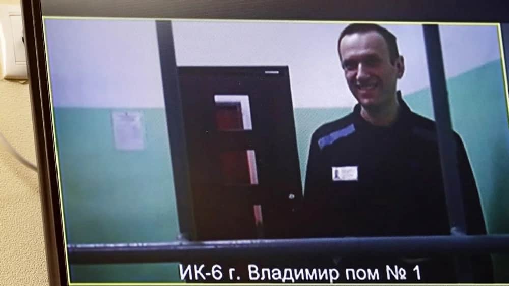Alexey Navalny seen on a screen as he appears in a video link from prison in September 2023. Photo: EPA-EFE/MAXIM SHIPENKOV